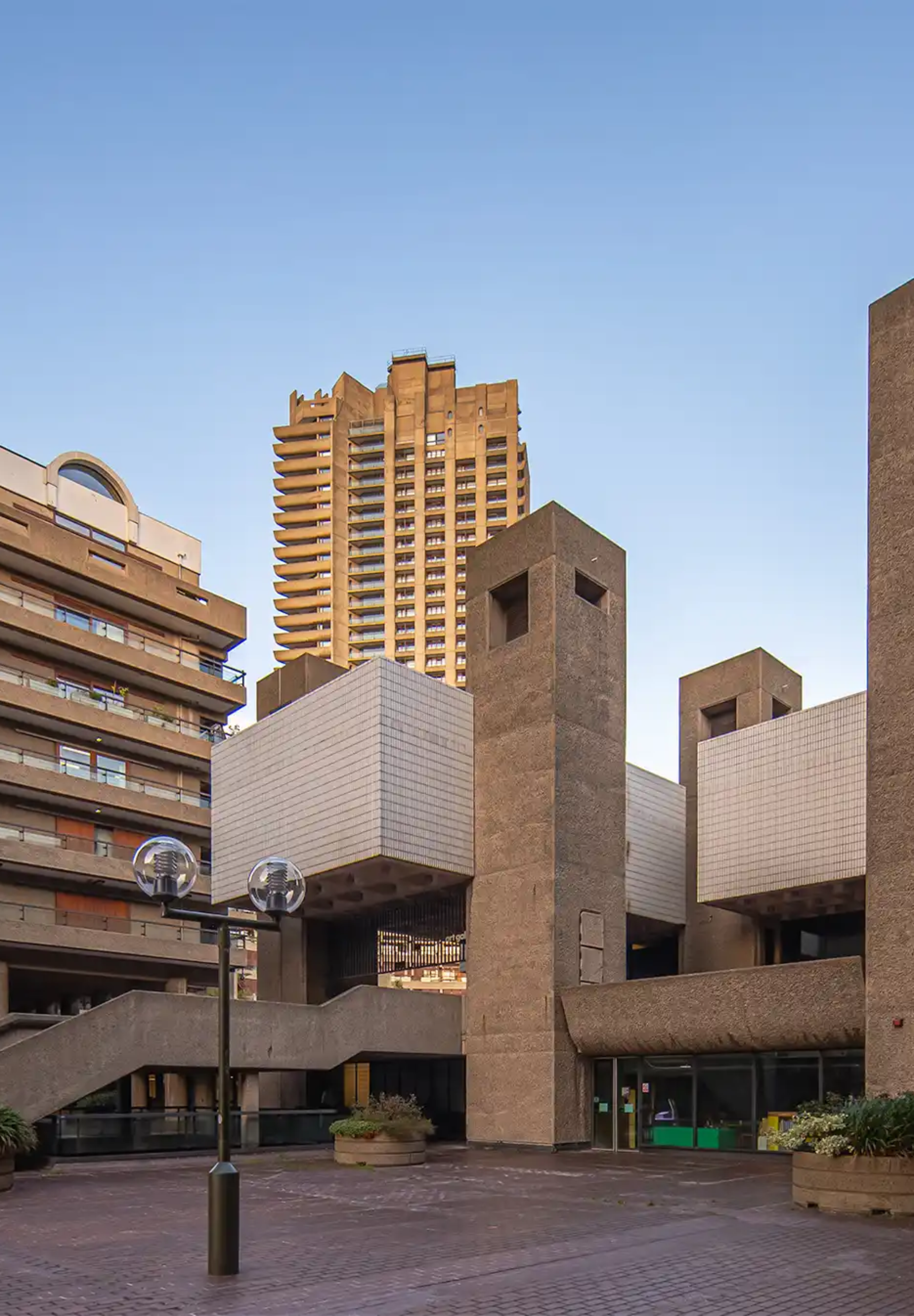 Barbican Estate with greenery and sunlight.