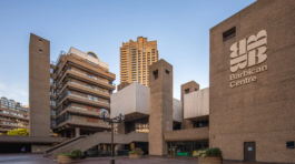 Barbican Estate with greenery and sunlight.